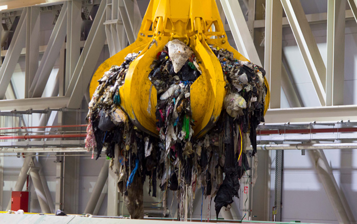 Grapple with trash